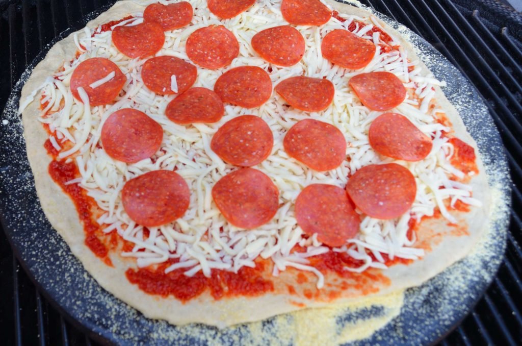 Slide your pizza off the peel using a quick back and forth motion